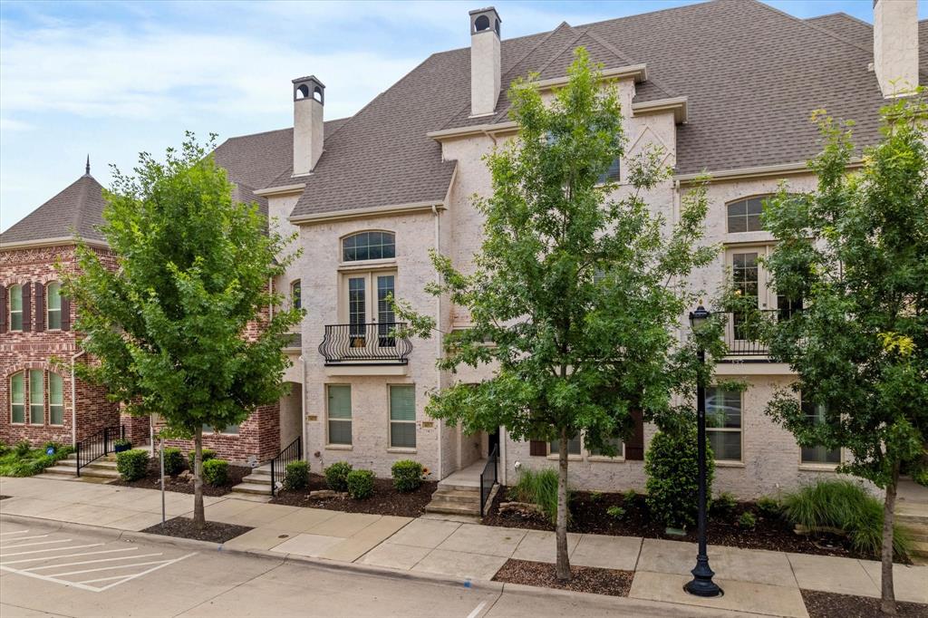 6013 Page Street Frisco, TX 75034 - Photo 3 of 39 a front view of a residential houses with yard