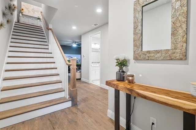 a entryway with flower pots