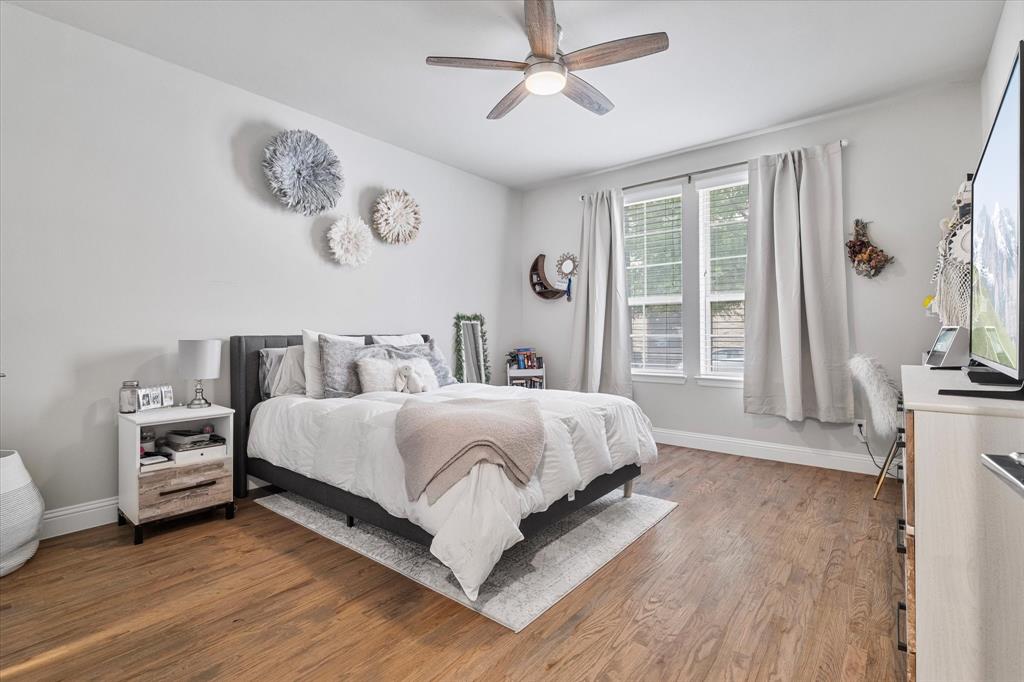 6013 Page Street Frisco, TX 75034 - Photo 8 of 39 a bedroom with bed and a window