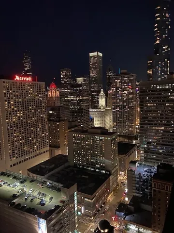 a kitchen with a table and chairs in it