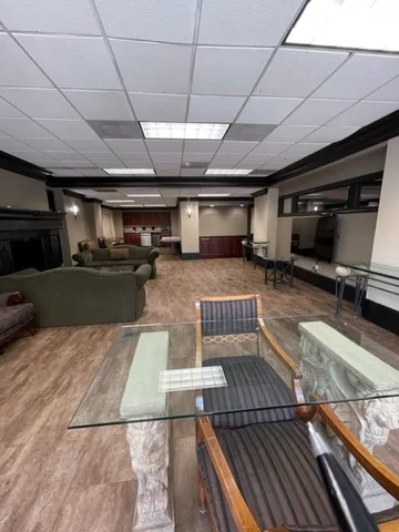 a view of a sitting area with furniture and garden