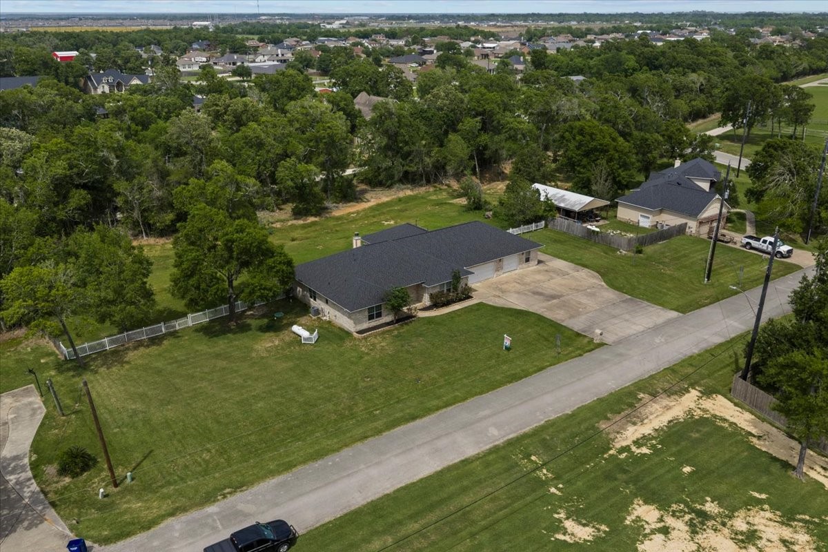 1607 Delta in Plantation, sitting on 1.19 acres surrounded by nature.