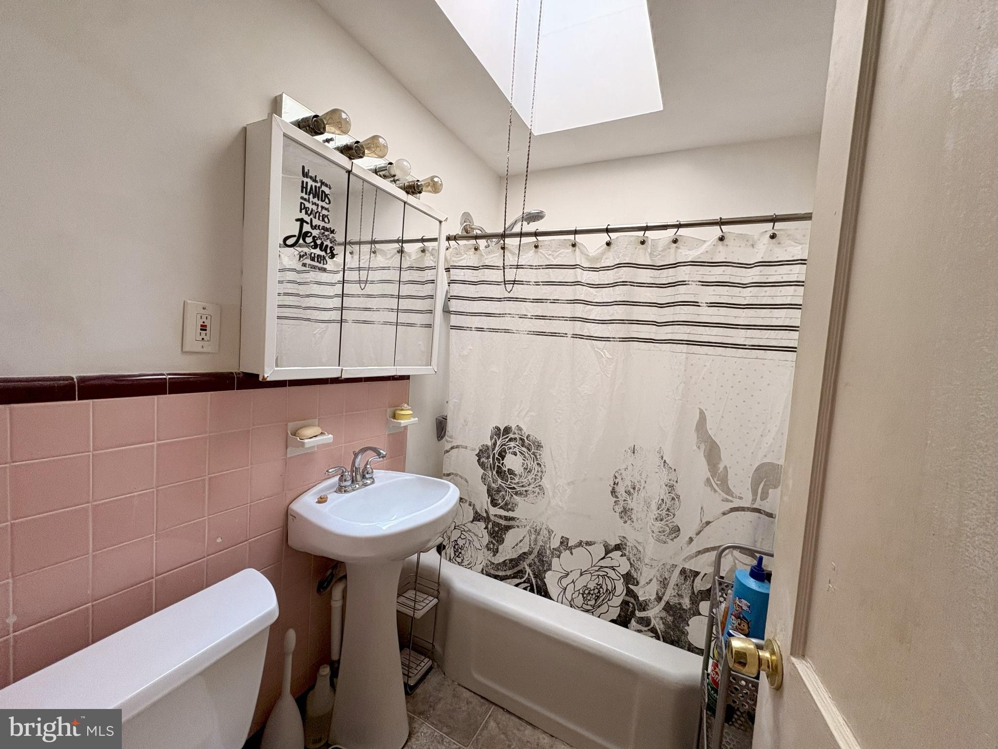 1072 South Merrimac Road Camden, NJ 08104 - Photo 13 of 14 Charming bathroom with vintage pink tiles.