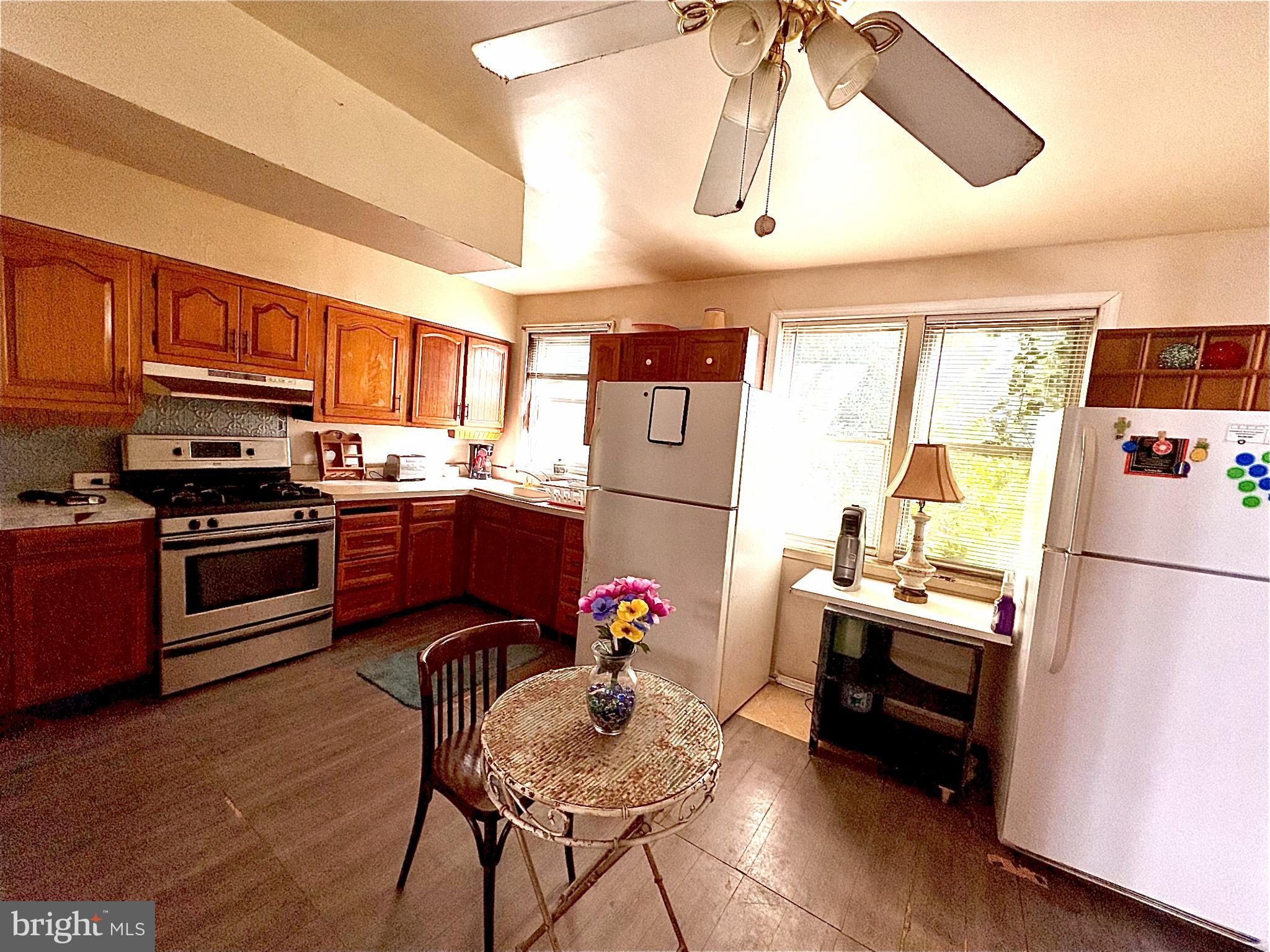 1072 South Merrimac Road Camden, NJ 08104 - Photo 4 of 14 Cozy kitchen with natural light and charm.