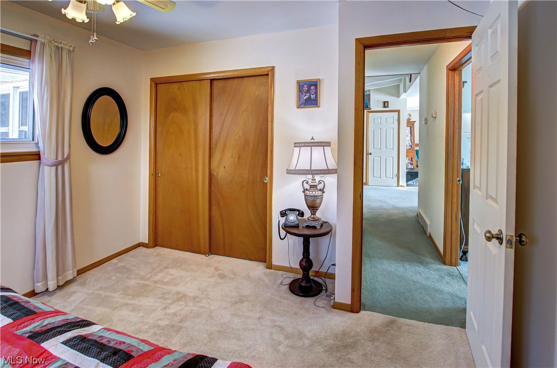 3711 Ruth Drive Brunswick, OH 44212 - Photo 18 of 35 Carpeted bedroom featuring a closet and ceiling fan