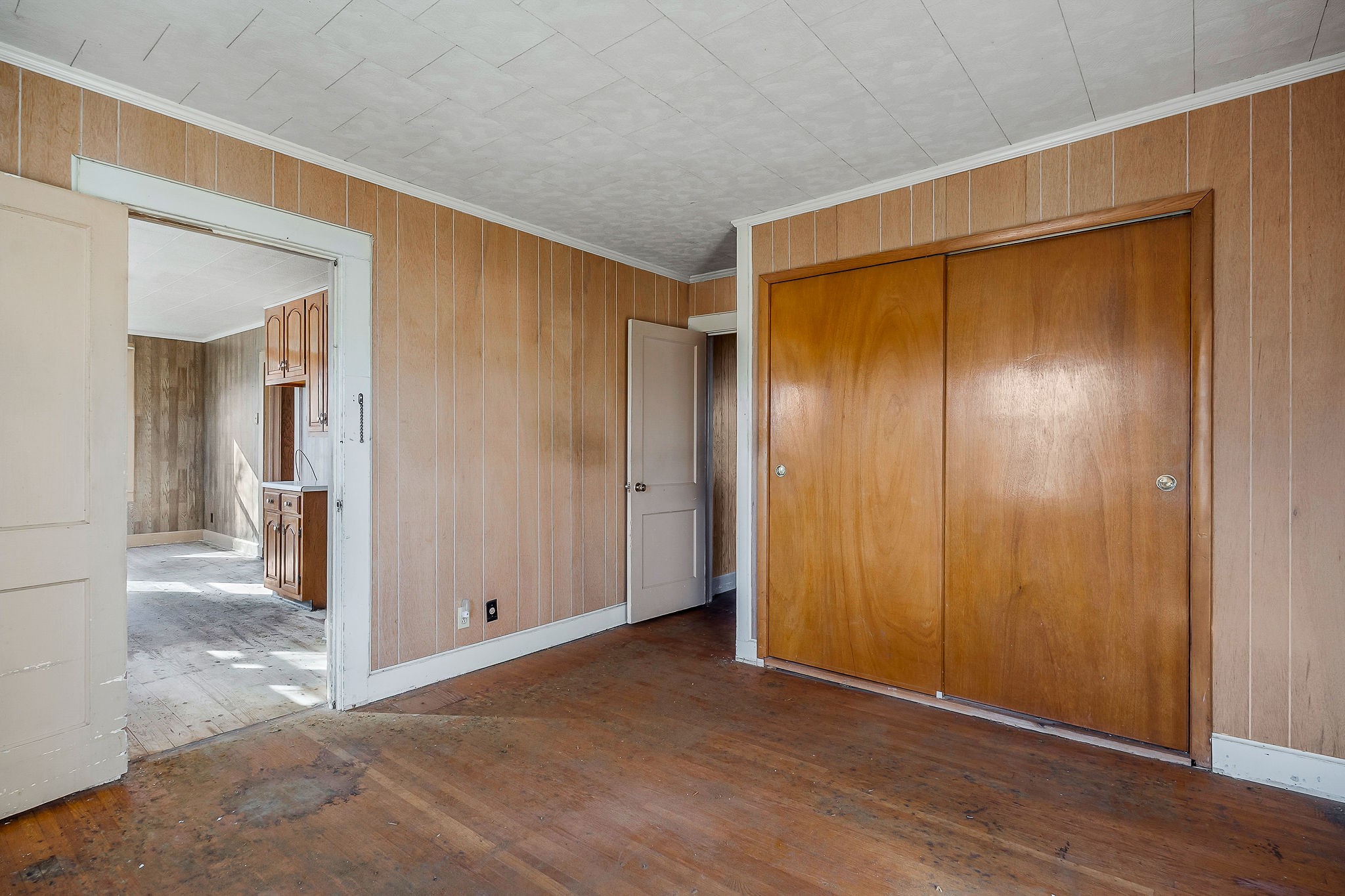 304 South Young Street Sparta, TN 38583 - Photo 14 of 20 a view of an empty room with wooden floor