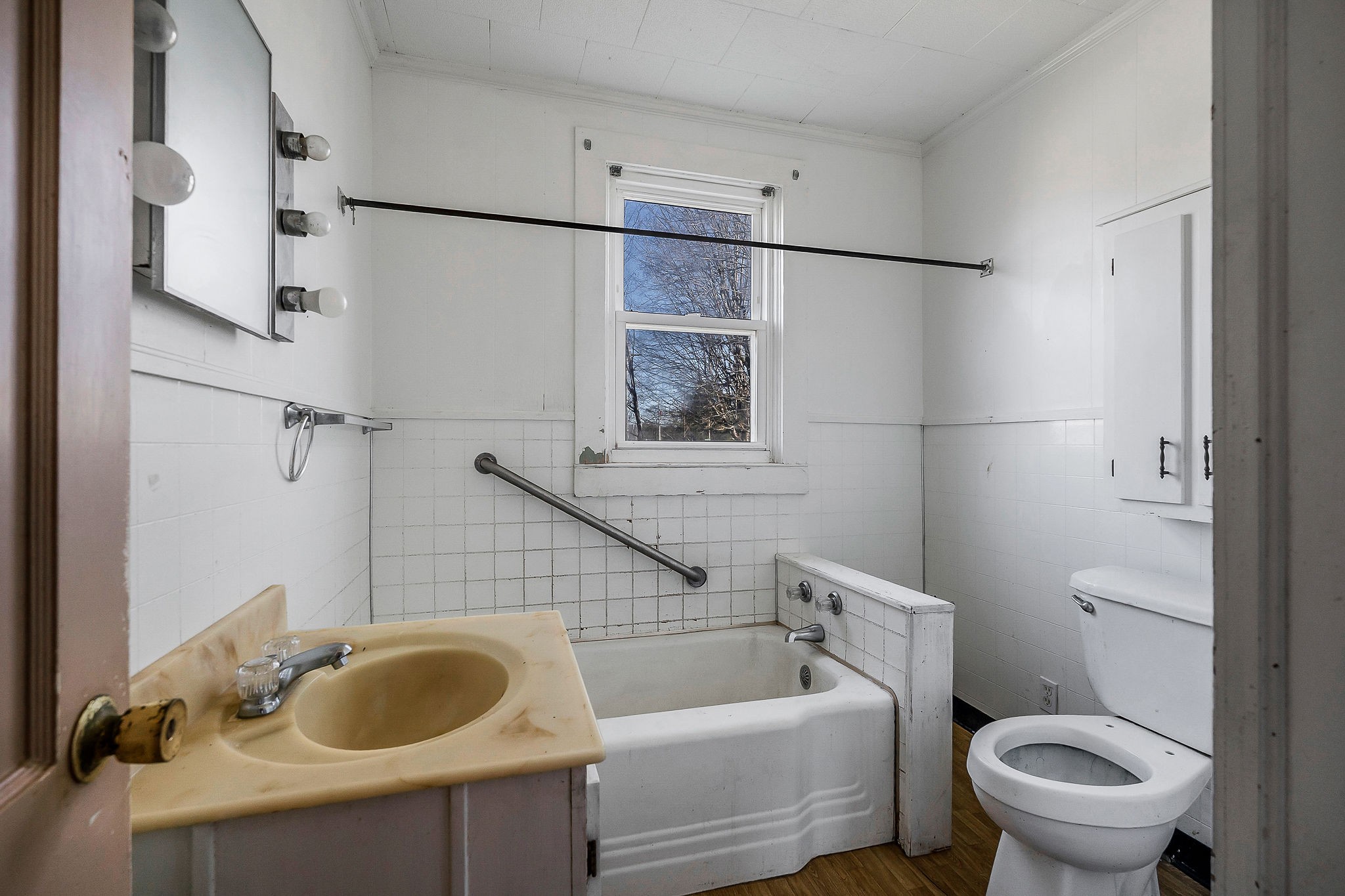 304 South Young Street Sparta, TN 38583 - Photo 17 of 20 a bathroom with a sink and a toilet