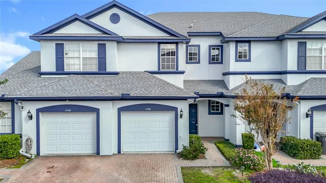 a view of a hallway with wooden floor and closet area