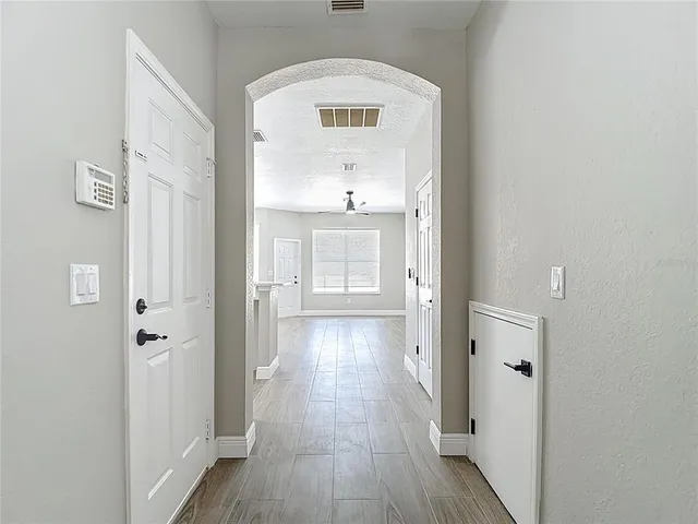 a kitchen with stainless steel appliances refrigerator and cabinets