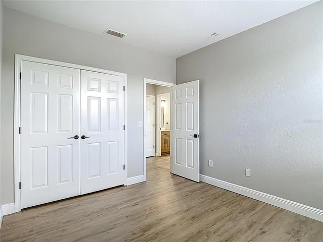 a view of a storage & utility room with two washing machine