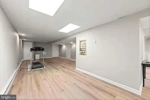 a bathroom with a double vanity sink and mirror