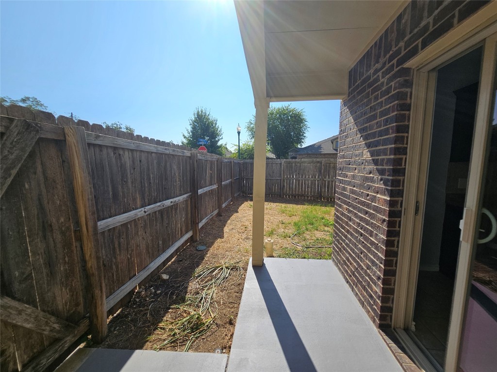 154 Sierra Rose Loop Georgetown, TX 78626 - Photo 11 of 13 a view of balcony with wooden floor