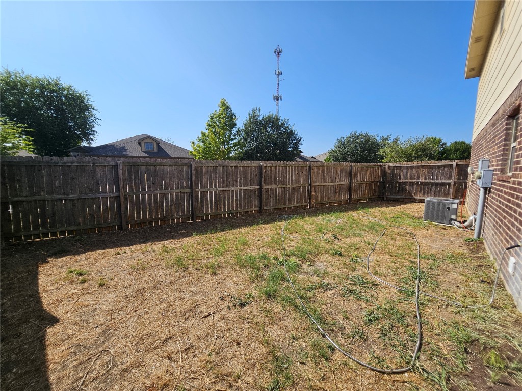 154 Sierra Rose Loop Georgetown, TX 78626 - Photo 12 of 13 a view of a backyard