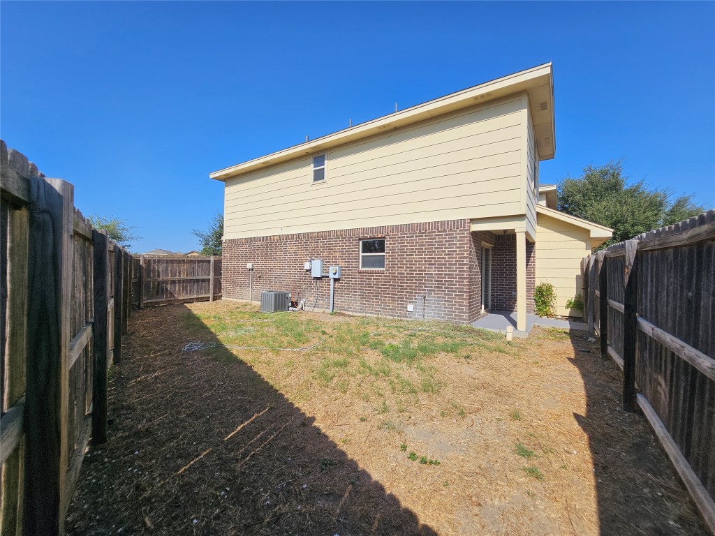 154 Sierra Rose Loop Georgetown, TX 78626 - Photo 13 of 13 a view of a backyard
