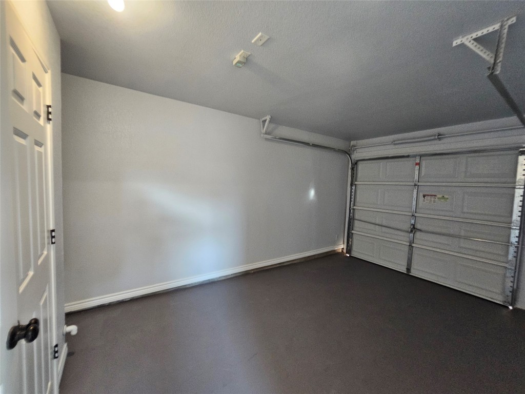 154 Sierra Rose Loop Georgetown, TX 78626 - Photo 9 of 13 wooden floor in an empty room