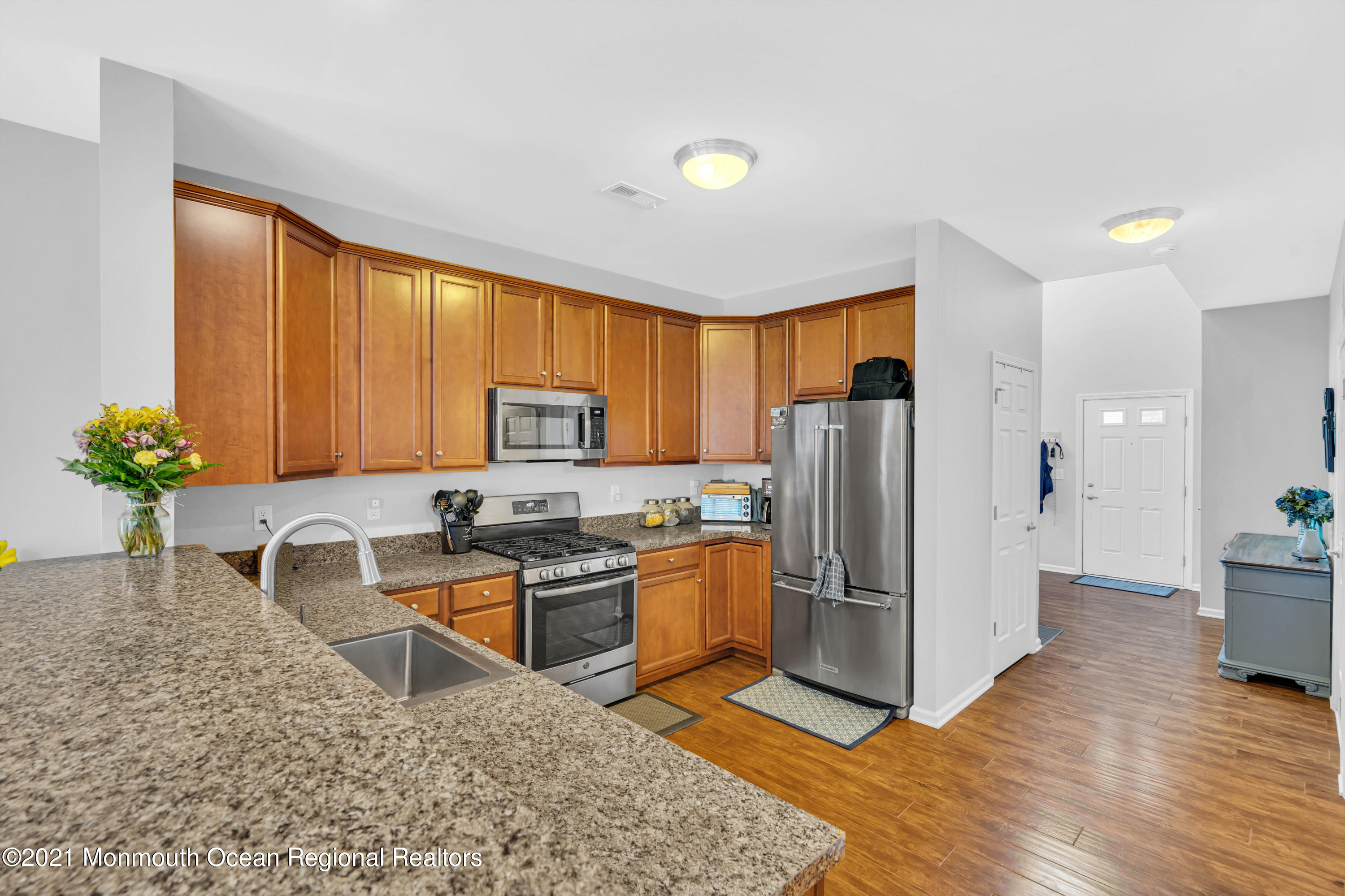36 Rockingham Way Manchester Township, NJ 08759 - Photo 15 of 40 a kitchen with stainless steel appliances granite countertop a refrigerator stove top oven a sink and dishwasher