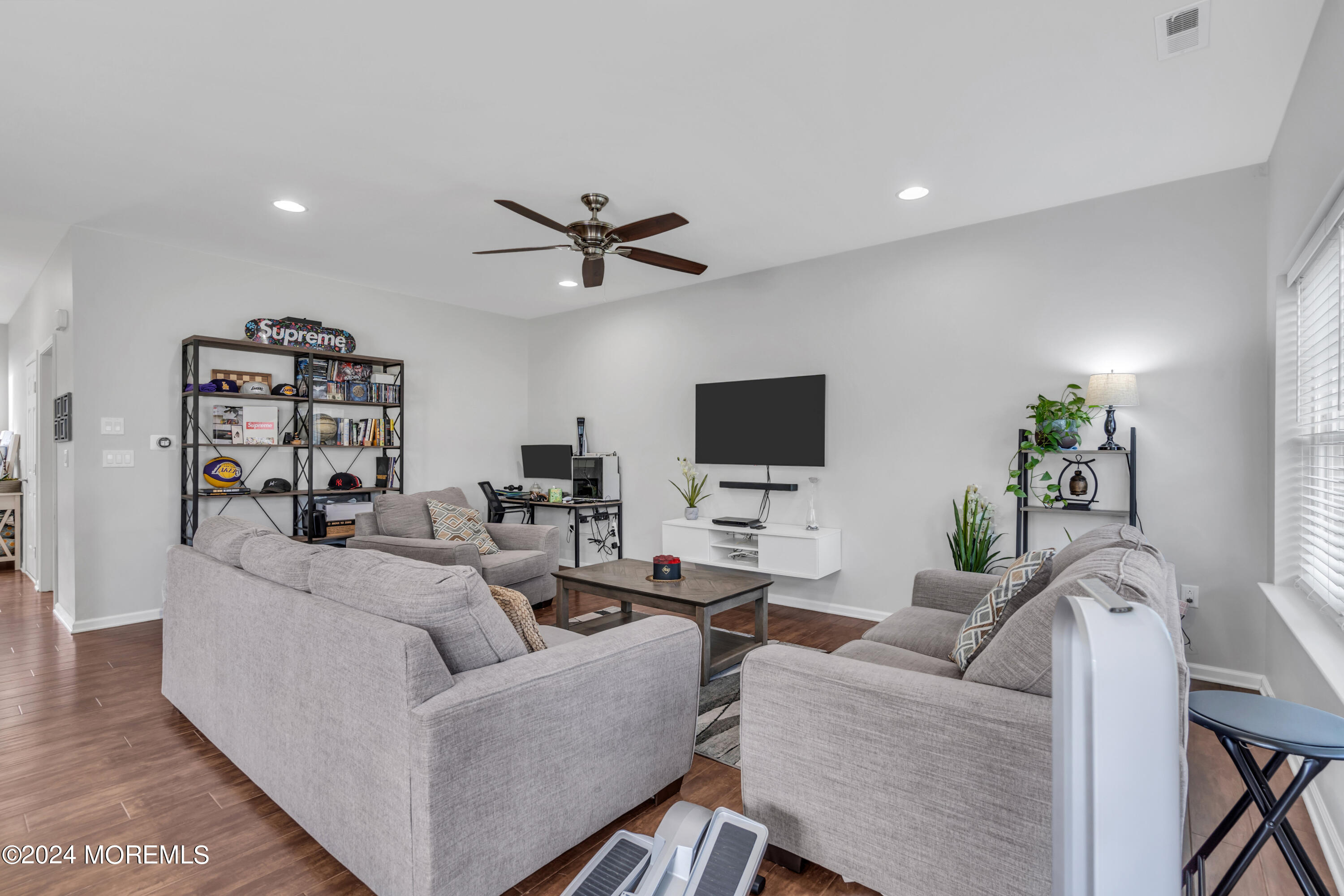 36 Rockingham Way Manchester Township, NJ 08759 - Photo 18 of 40 a living room with furniture and a flat screen tv