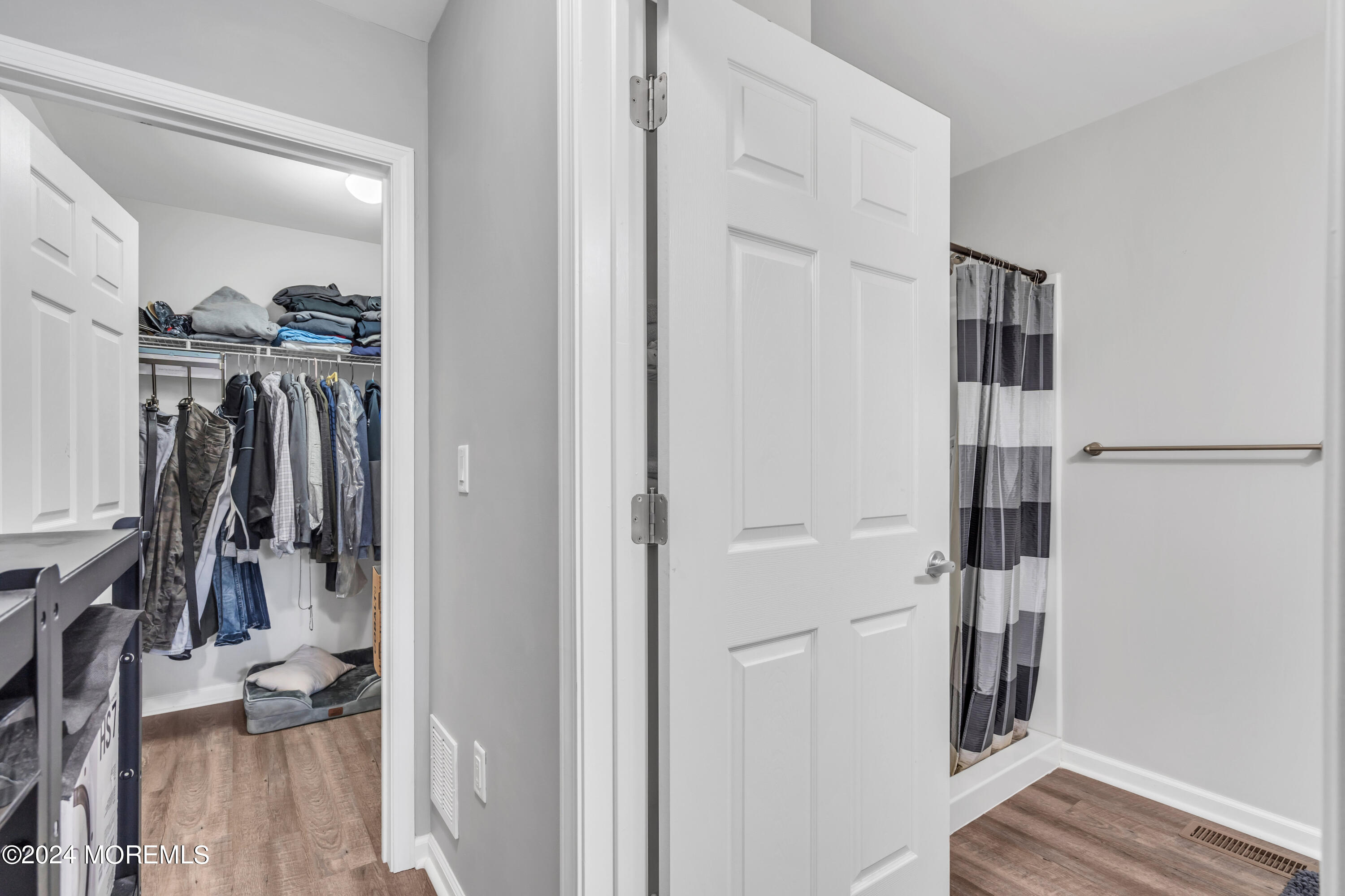 36 Rockingham Way Manchester Township, NJ 08759 - Photo 25 of 40 a view of walk in closet with clothes and shoes