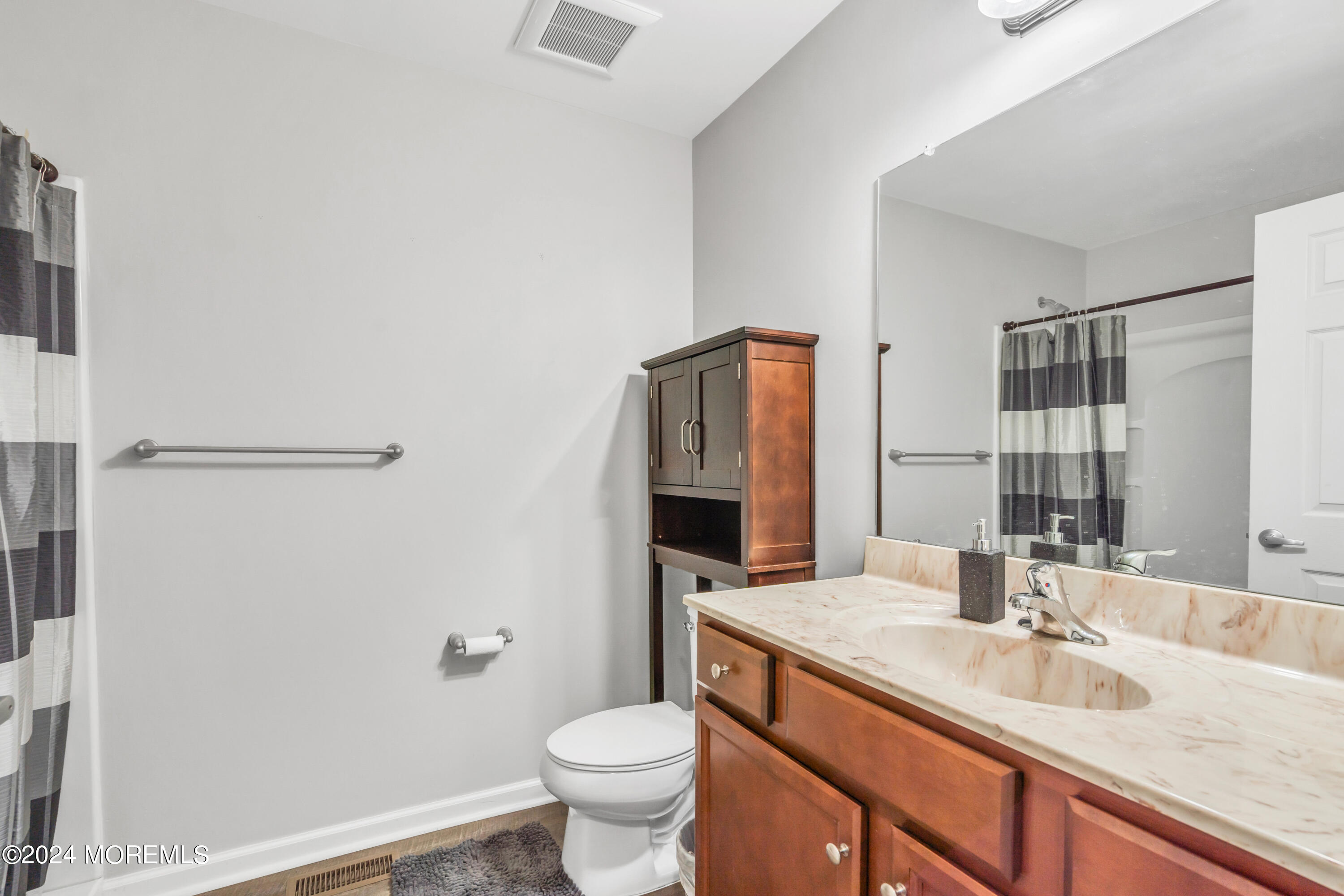 36 Rockingham Way Manchester Township, NJ 08759 - Photo 27 of 40 a bathroom with a granite countertop sink toilet and shower
