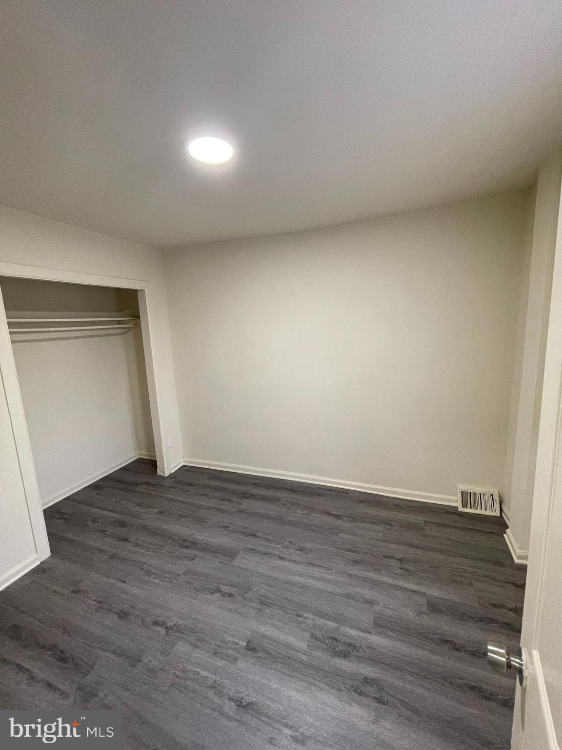 2441 North 5th Street Philadelphia, PA 19133 - Photo 13 of 18 a view of an empty room and wooden floor