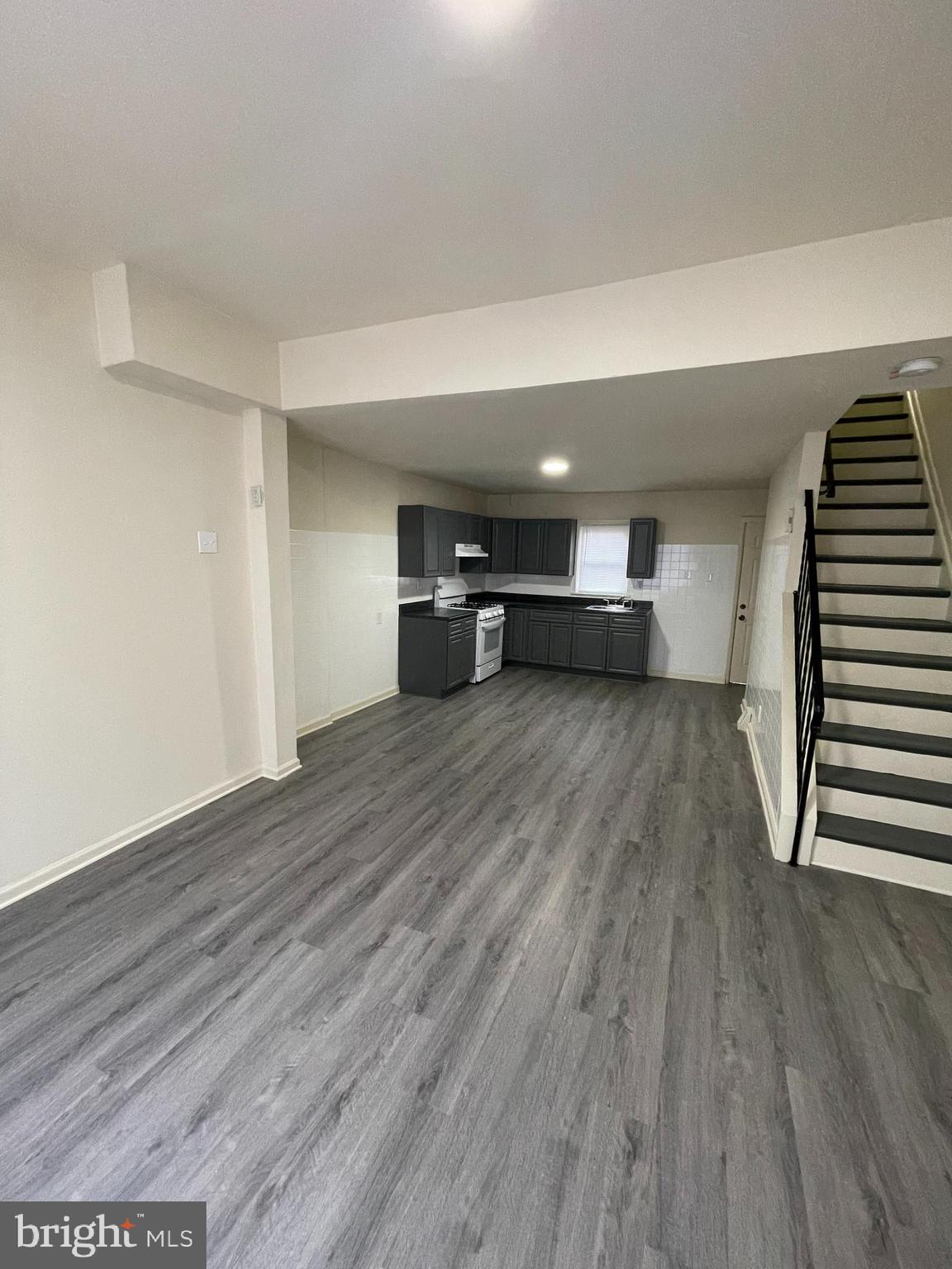 2441 North 5th Street Philadelphia, PA 19133 - Photo 5 of 18 a view of empty room with wooden floor