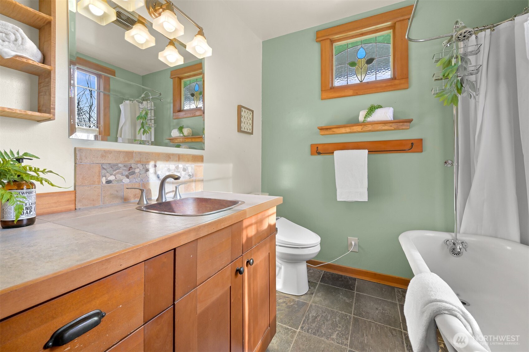 4186 Rural Avenue Bellingham, WA 98226 - Photo 17 of 40 a bathroom with a sink toilet and shower
