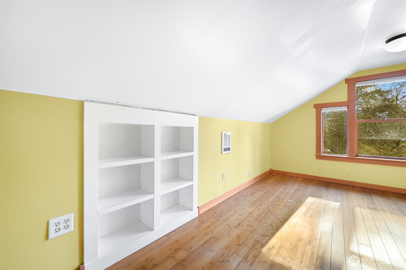 4186 Rural Avenue Bellingham, WA 98226 - Photo 23 of 40 a view of an empty room with wooden floor and a window