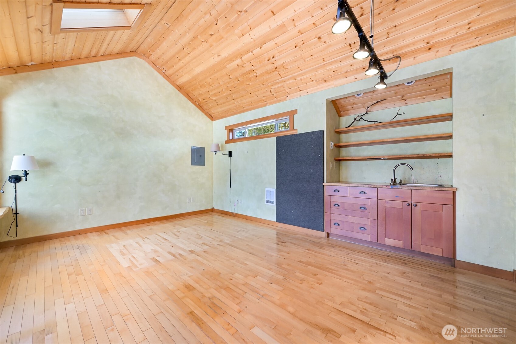 4186 Rural Avenue Bellingham, WA 98226 - Photo 30 of 40 a view of an empty room with wooden floor and a window