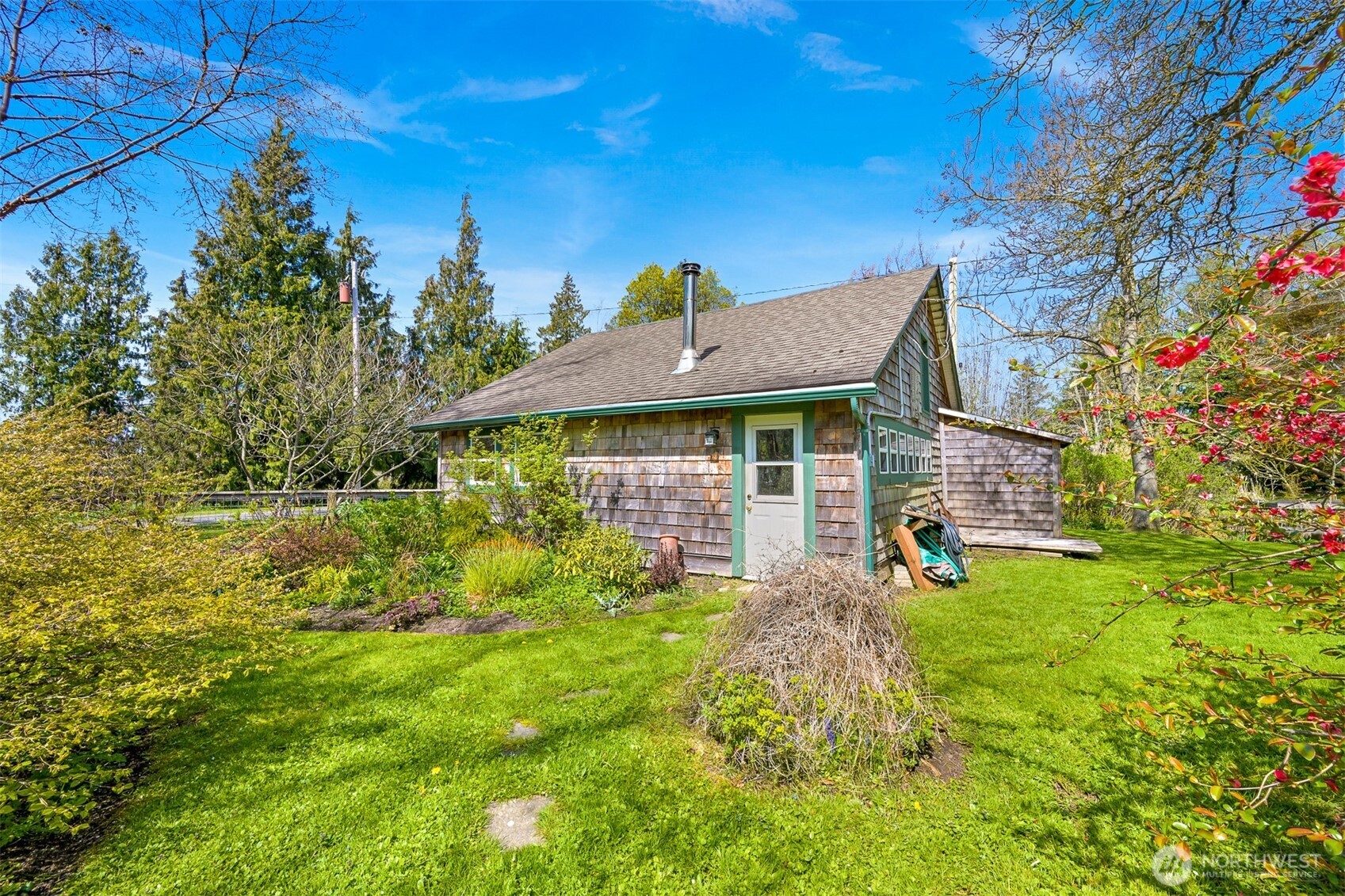 4186 Rural Avenue Bellingham, WA 98226 - Photo 34 of 40 a front view of a house with garden