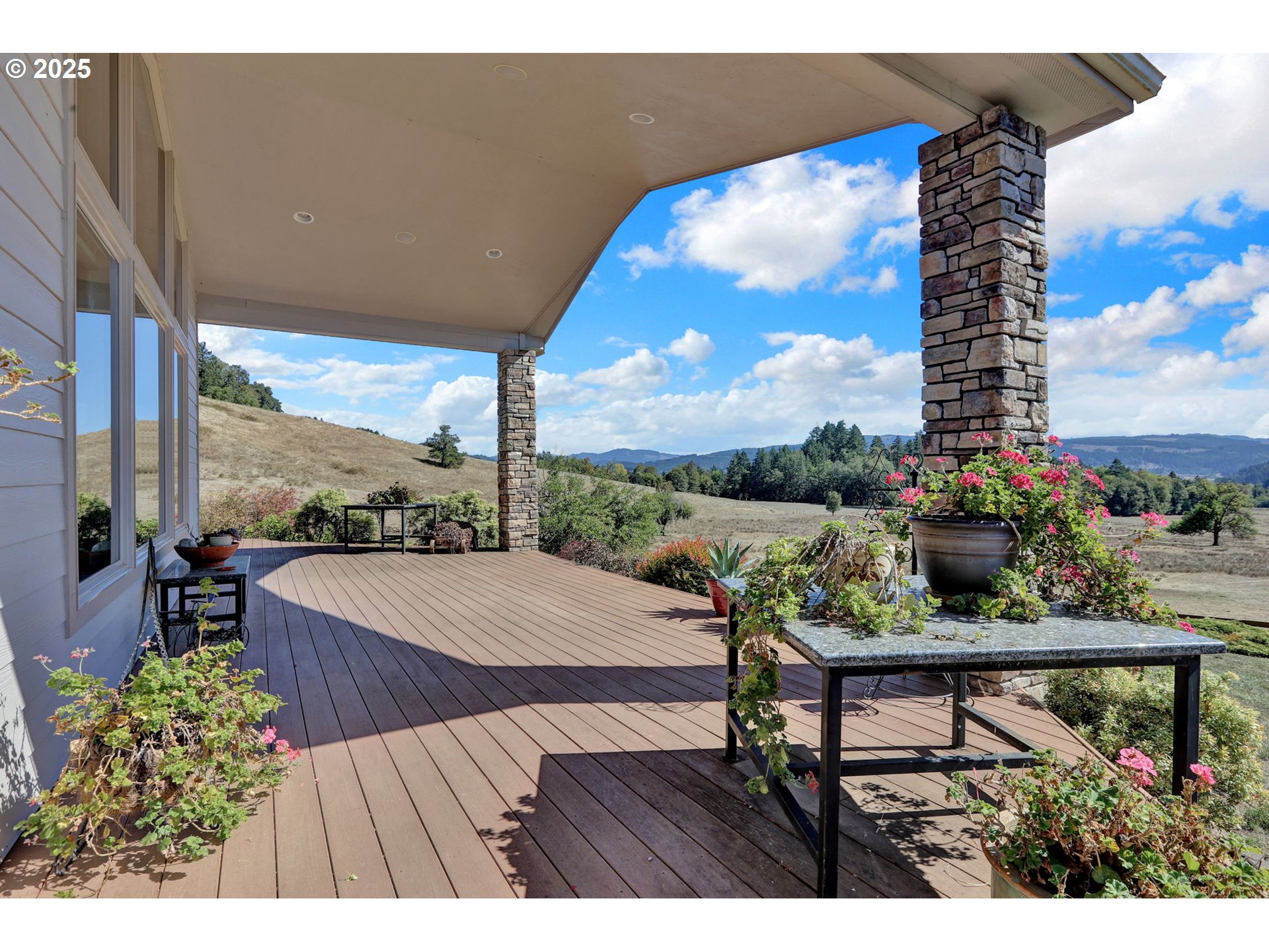 485 Andrews Road Yoncalla, OR 97499 - Photo 11 of 46 a view of a patio with furniture and a garden