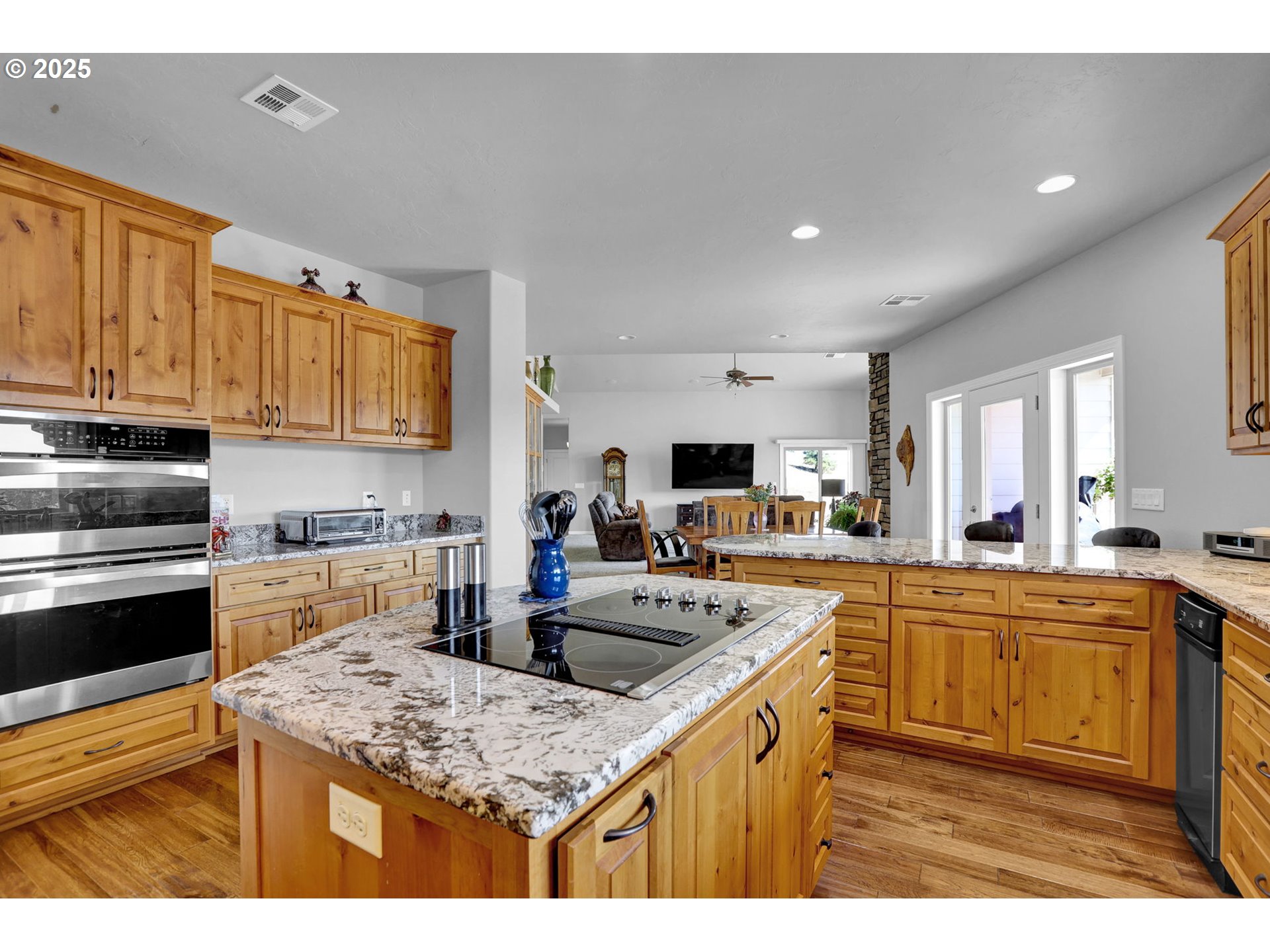 485 Andrews Road Yoncalla, OR 97499 - Photo 13 of 46 a kitchen with stainless steel appliances granite countertop a sink stove and refrigerator