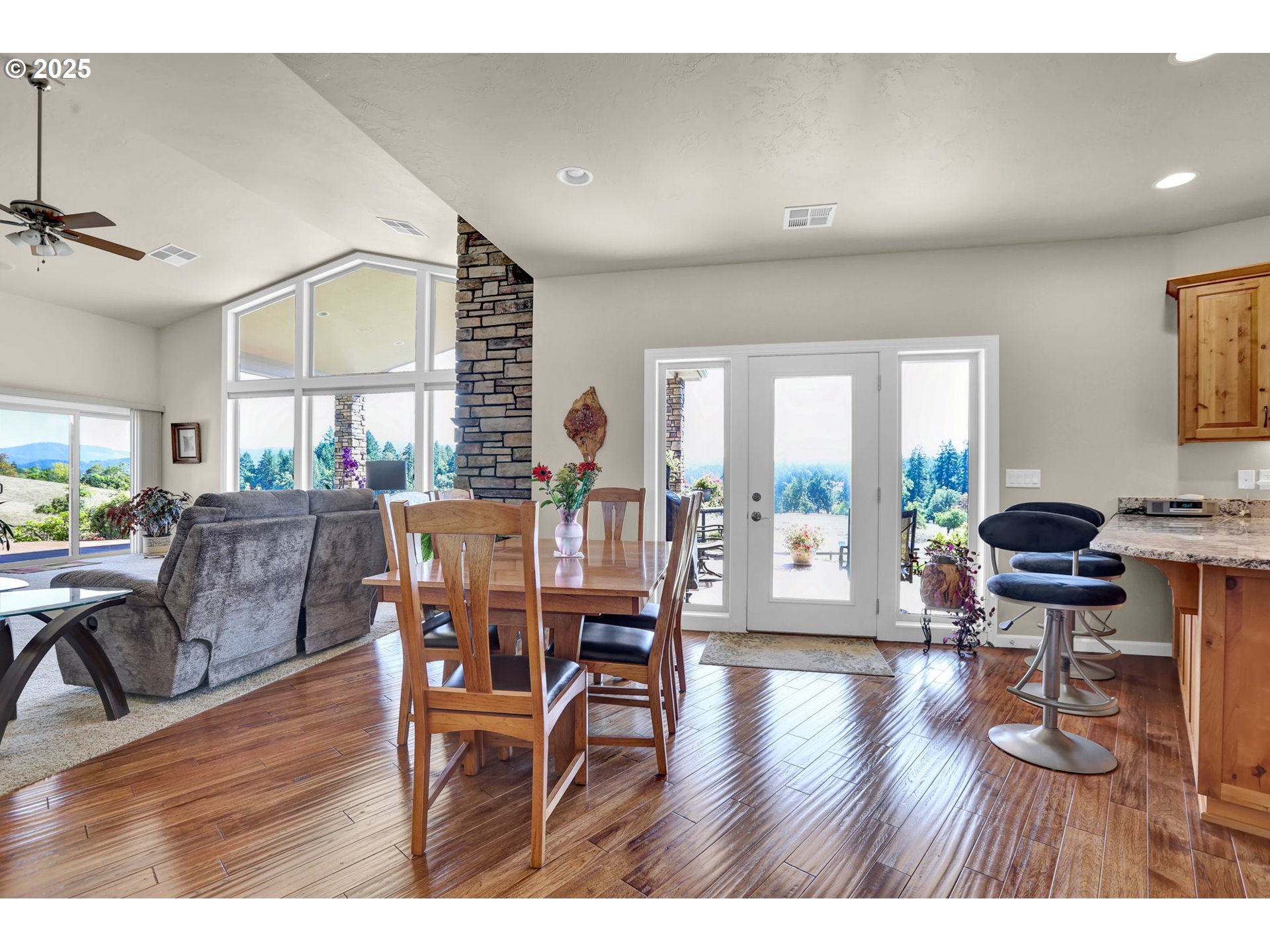 485 Andrews Road Yoncalla, OR 97499 - Photo 14 of 46 a living room with furniture and a wooden floor