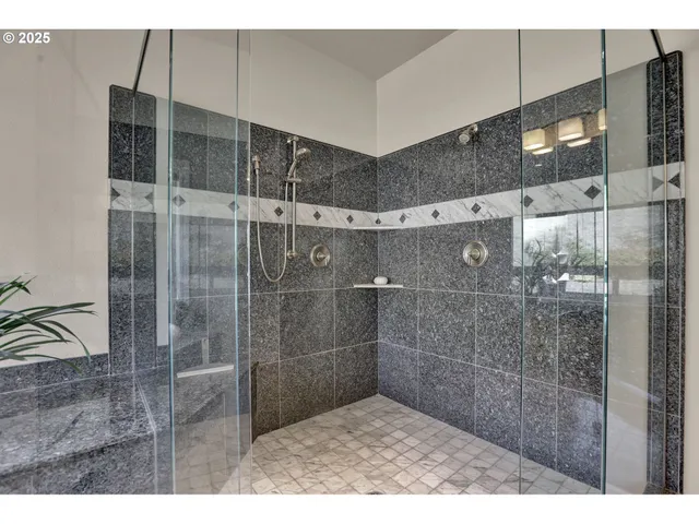 a kitchen with stainless steel appliances wooden floors and wooden cabinets