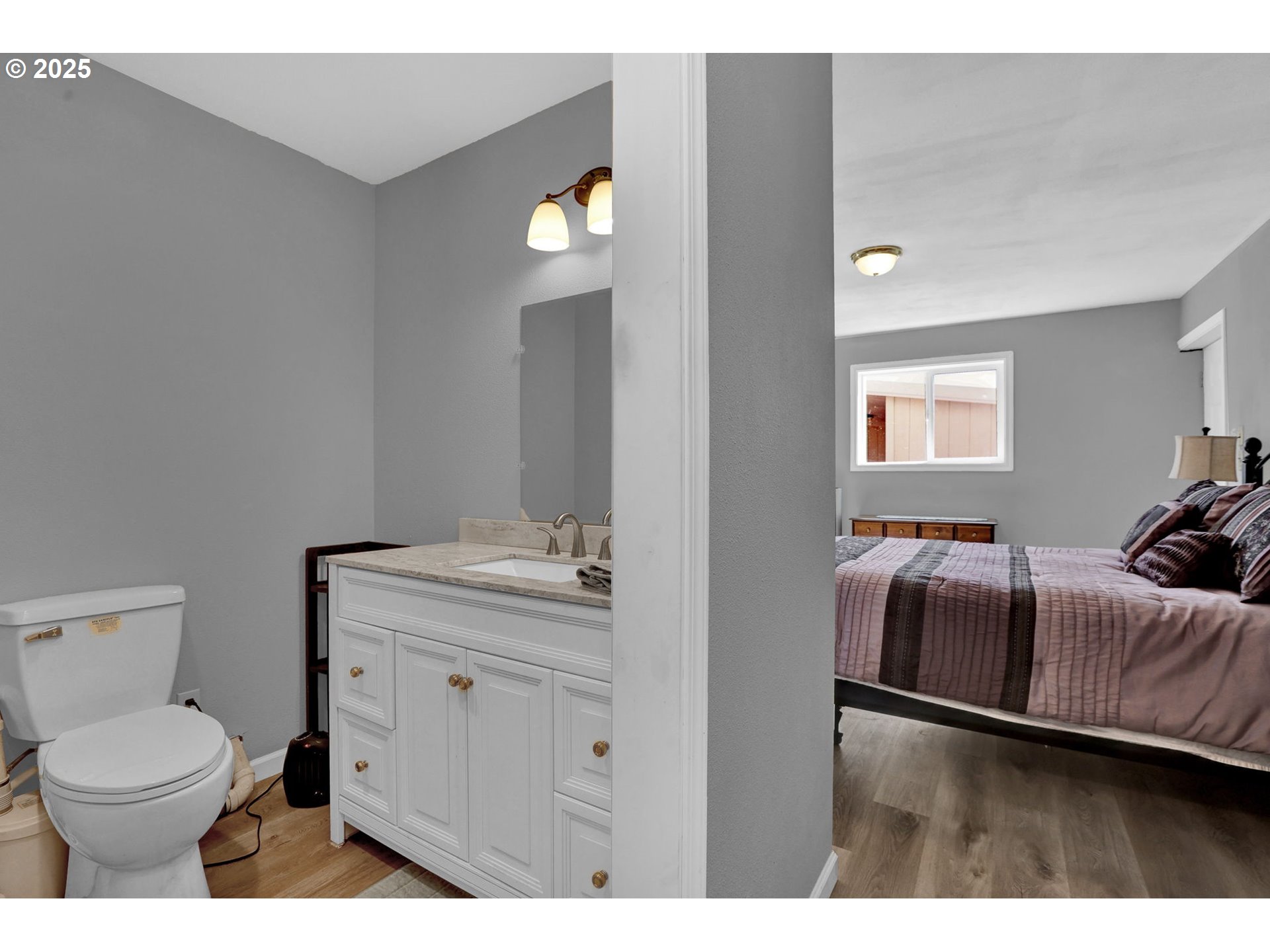 485 Andrews Road Yoncalla, OR 97499 - Photo 36 of 46 a en suite bathroom with a toilet sink and mirror