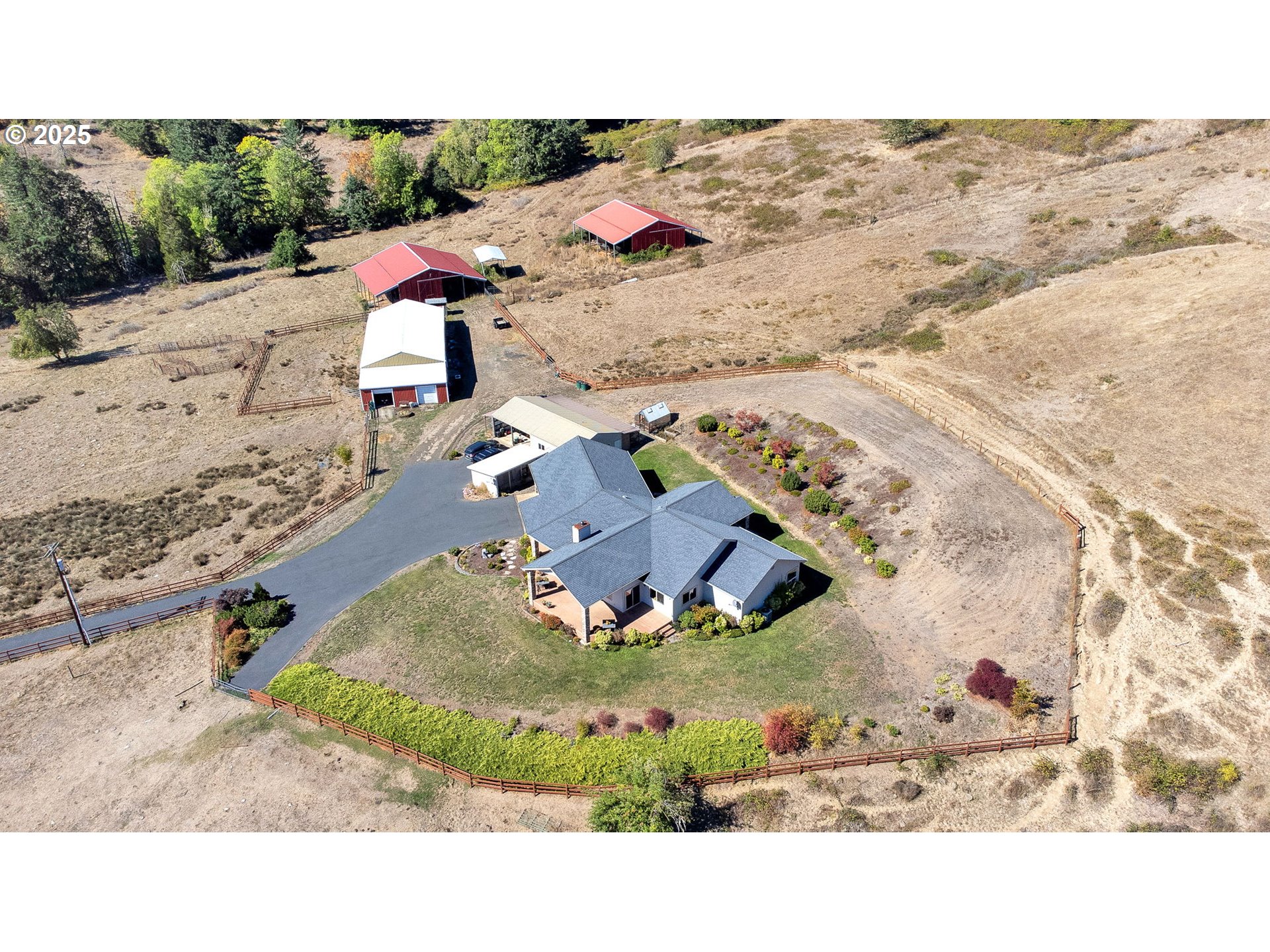 485 Andrews Road Yoncalla, OR 97499 - Photo 4 of 46 an aerial view of a house with a yard