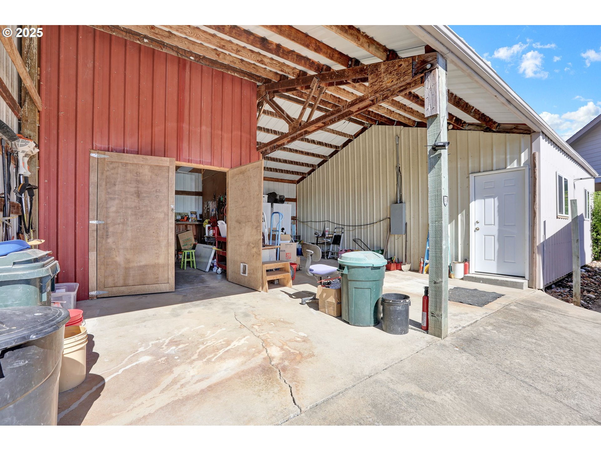 485 Andrews Road Yoncalla, OR 97499 - Photo 43 of 46 a bed room with a bed and a chair
