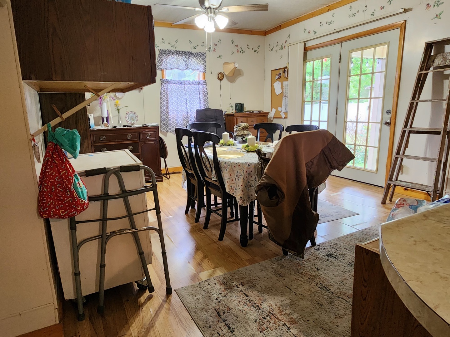 202 Lincoln Street Karnak, IL 62956 - Photo 11 of 45 a view of a dining room with furniture and a window