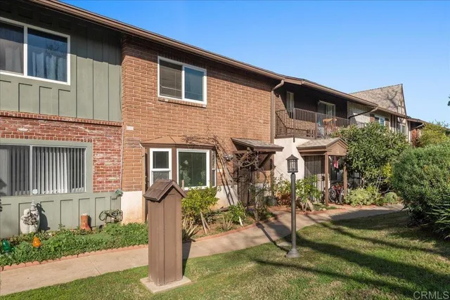 front view of house with a yard