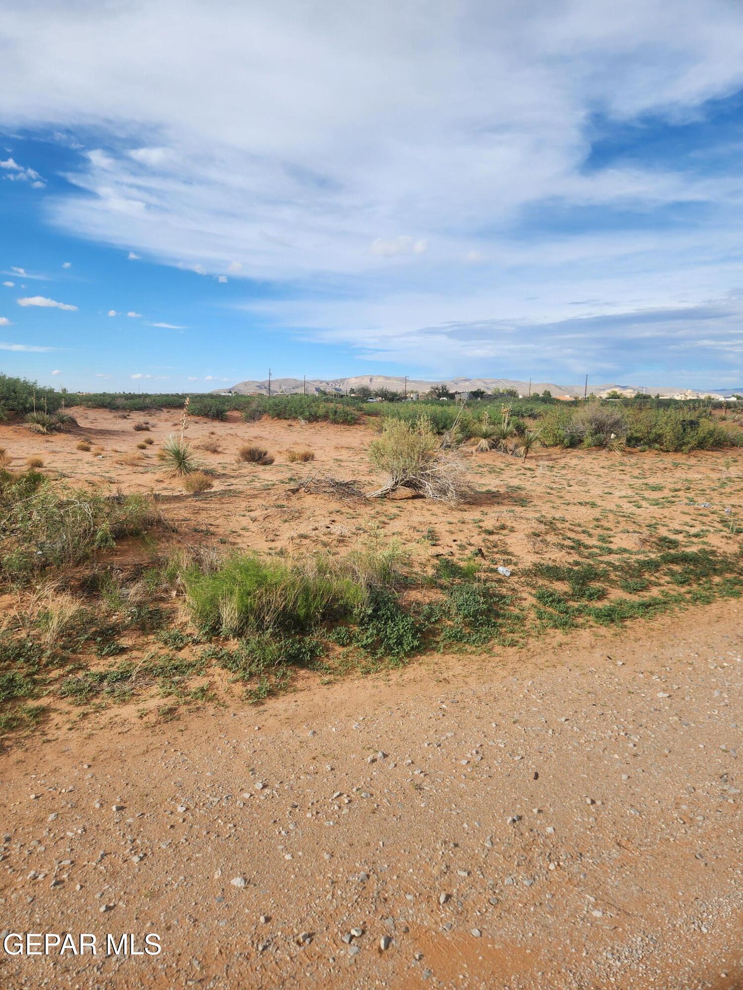 4701 Bueno Terrace Road El Paso, TX 79938 - Photo 10 of 11 a view of an ocean beach