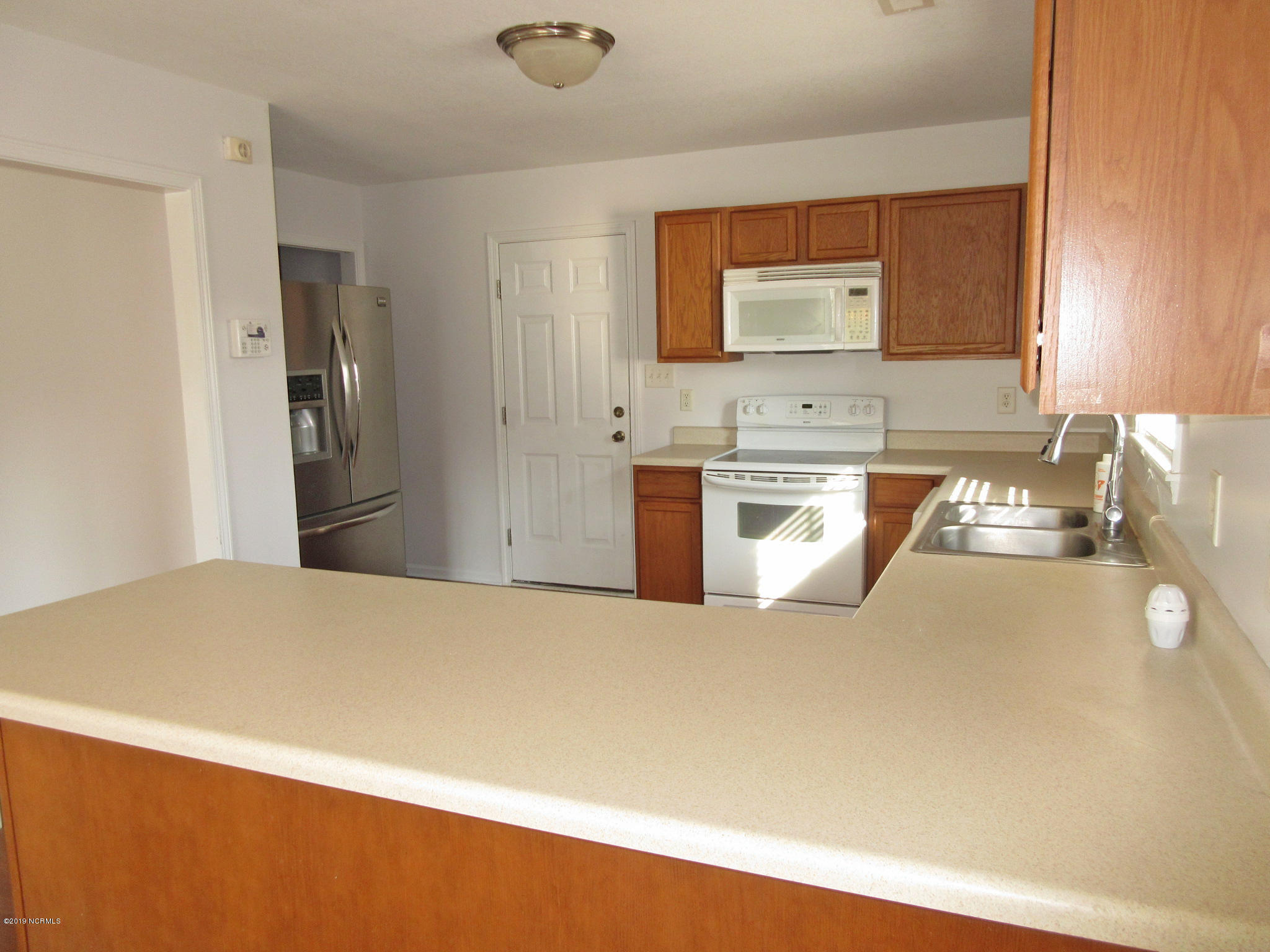 312 Trappers Road Hubert, NC 28539 - Photo 7 of 17 312 Trappers Rd - Kitchen 2