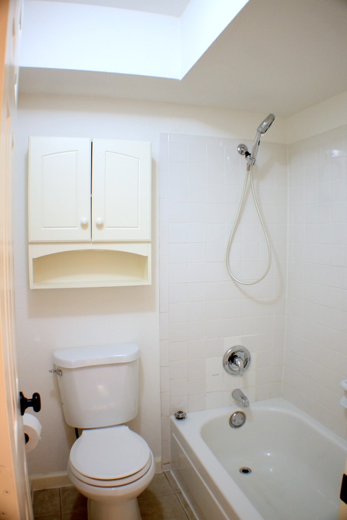 5100 Allendale Road, Unit 207 Houston, TX 77017 - Photo 27 of 34 a bathroom with a sink a toilet and shower