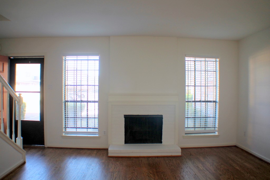 5100 Allendale Road, Unit 207 Houston, TX 77017 - Photo 6 of 34 an empty room with wooden floor and windows