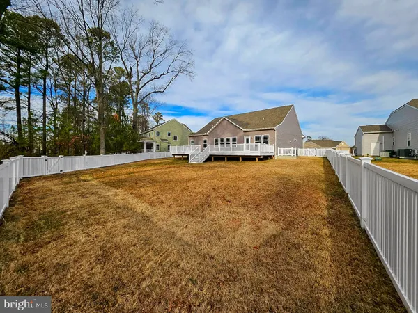 a view of a large building with large trees