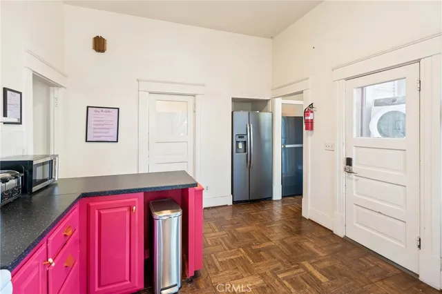 a living room with furniture and a rug