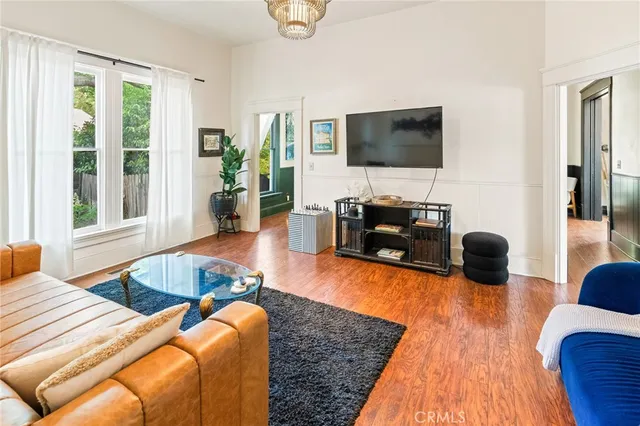 a kitchen with a refrigerator and cabinets