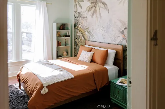a bathroom with a sink mirror vanity and toilet