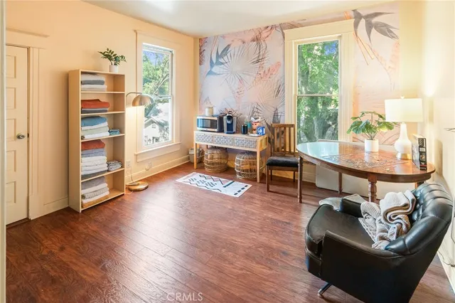a bathroom with a toilet a sink and a mirror