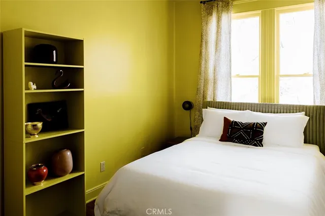 a en suite bathroom with a sink and a mirror