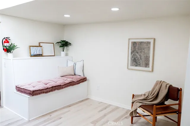 a view of patio with a table and chairs under an umbrella
