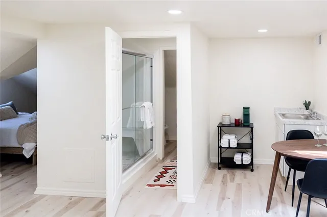 a view of backyard with outdoor seating and a patio